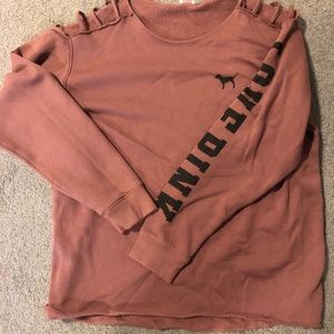 Pink sweatshirt with cut out at shoulders
